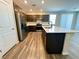 Spacious kitchen with stainless steel appliances, an island, and plenty of counter space at 9348 Wildcat Peak St, Las Vegas, NV 89178
