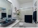 Well-lit bathroom featuring a glass shower, decorative vessel sink and modern fixtures at , North Las Vegas, NV 89031