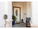 Close-up of front door with decorative wreath and potted plants, showcasing a charming entrance at , North Las Vegas, NV 89031