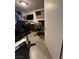 Bedroom with laminate flooring, fan, and closet space at 10265 Moth Orchid Ct, Las Vegas, NV 89183