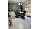 Dining area with modern table set and view to back yard at 10265 Moth Orchid Ct, Las Vegas, NV 89183