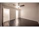 Room showcasing a ceiling fan, closet, and adjoining bathroom in a luminous setting at 10414 Midseason Mist St, Las Vegas, NV 89183
