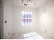 Bright dining area with marble floors and a large window at 10414 Midseason Mist St, Las Vegas, NV 89183