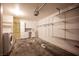 Spacious garage with storage shelves and laundry machines at 10414 Midseason Mist St, Las Vegas, NV 89183