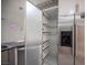 View of pantry cabinet with slide out storage in the kitchen at 10414 Midseason Mist St, Las Vegas, NV 89183