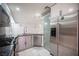 Kitchen features stainless steel appliances, granite countertops, and modern cabinets at 10414 Midseason Mist St, Las Vegas, NV 89183
