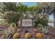 Silverado Place community sign surrounded by desert landscaping and flowering bushes at 10414 Midseason Mist St, Las Vegas, NV 89183