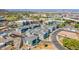 View of modern townhomes showcasing a clean design and community layout in an urban setting at 145 Aqua Commons Ln, Henderson, NV 89015
