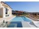 Gorgeous backyard pool and spa with stunning views, perfect for outdoor entertaining at 1616 Villa Rica Dr, Henderson, NV 89052