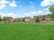Expansive green space provides a lush recreational area for community residents at 1631 Desert Path Ave, North Las Vegas, NV 89032