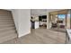 Open concept living space offers modern kitchen, dining area and outdoor patio at 1631 Desert Path Ave, North Las Vegas, NV 89032