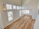 Spacious living room with lots of natural light from multiple windows at 1716 Klamath Falls Way, Las Vegas, NV 89128