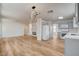 Open-concept living area combines a kitchen, fireplace, and ample space, ideal for entertaining and everyday living at 1716 Klamath Falls Way, Las Vegas, NV 89128