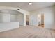 Spacious upstairs loft area with carpet and view of bathroom at 1716 Klamath Falls Way, Las Vegas, NV 89128