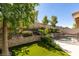 Well-manicured backyard with tiered landscaping and a private pool at 1779 Antelope Valley Ave, Henderson, NV 89012