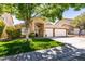 Charming home with a well-maintained lawn and a three-car garage at 1779 Antelope Valley Ave, Henderson, NV 89012