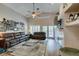 Spacious living room with a cozy fireplace and plenty of natural light at 1779 Antelope Valley Ave, Henderson, NV 89012