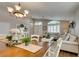 Bright open-concept living space adjacent to dining area at 1779 Antelope Valley Ave, Henderson, NV 89012