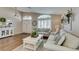 Spacious living room with lots of natural light and tasteful decor at 1779 Antelope Valley Ave, Henderson, NV 89012