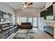 Bright and airy living room with fireplace and access to outdoor area at 1779 Antelope Valley Ave, Henderson, NV 89012