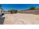 Spacious and private backyard offers potential for customization with block wall at 2112 Hollow Oak Ave, North Las Vegas, NV 89031