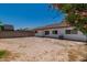 Good-sized backyard featuring room for outdoor enjoyment, with access to the home at 2112 Hollow Oak Ave, North Las Vegas, NV 89031