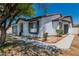 Charming single story house boasts manicured landscaping and inviting curb appeal at 2112 Hollow Oak Ave, North Las Vegas, NV 89031