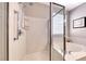 Clean, bright bathroom with glass shower and soaking tub at 2205 Sandstone Cliffs Dr, Henderson, NV 89044