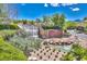 The welcoming entrance to the community, featuring a stunning waterfall and landscaped surroundings at 2205 Sandstone Cliffs Dr, Henderson, NV 89044