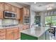 Well-equipped kitchen with stainless appliances, granite countertops, and modern fixtures at 2205 Sandstone Cliffs Dr, Henderson, NV 89044