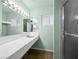 Bathroom in green with an extra long vanity at 2245 Sombrero Dr, Las Vegas, NV 89169