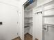 Walk-in closet featuring custom shelving and ample storage space at 2245 Sombrero Dr, Las Vegas, NV 89169