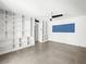 Bright room with built-in shelves and a large blue-shaded window at 2245 Sombrero Dr, Las Vegas, NV 89169