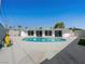 Backyard view showcasing a pristine pool surrounded by concrete patio and modern design at 2245 Sombrero Dr, Las Vegas, NV 89169