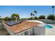 Roof with solar panels provides energy efficiency and a glimpse of the pool below at 2245 Sombrero Dr, Las Vegas, NV 89169