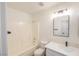 Bathroom featuring a shower-tub, sleek vanity, and modern finishes at 2403 Sexton Ave, North Las Vegas, NV 89031