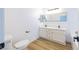Bathroom featuring dual sinks, modern fixtures, and a toilet at 2403 Sexton Ave, North Las Vegas, NV 89031