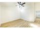 Bedroom featuring vaulted ceilings, wood floors, and a ceiling fan at 2403 Sexton Ave, North Las Vegas, NV 89031