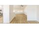 Bright, open living area with wood-look flooring, seamlessly connecting to other spaces at 2403 Sexton Ave, North Las Vegas, NV 89031