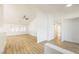 Bright open-concept living room with high ceilings and luxury vinyl flooring, perfect for entertaining at 2403 Sexton Ave, North Las Vegas, NV 89031