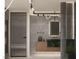 Elegant bathroom with a glass shower door, modern vanity, and stylish fixtures at 2935 Montessouri St, Las Vegas, NV 89117