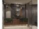 Luxurious bathroom featuring double sinks, a walk-in shower, and stylish design at 2935 Montessouri St, Las Vegas, NV 89117