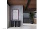 Modern hallway with stylish console table, wall art, and natural light at 2935 Montessouri St, Las Vegas, NV 89117