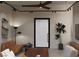 Modern living room showcasing minimalist decor, track lighting, and a comfortable seating area at 2935 Montessouri St, Las Vegas, NV 89117
