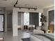 Spacious living room with a fireplace, stylish seating, and modern lighting fixtures at 2935 Montessouri St, Las Vegas, NV 89117