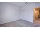 Bedroom features neutral carpet and sliding closet doors at 31 Newport Edge Pl, Henderson, NV 89015