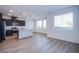 Spacious and open kitchen area with a quartz island and natural light from windows at 31 Newport Edge Pl, Henderson, NV 89015
