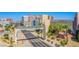 Street view of the Water Street District entrance, lined with palm trees and inviting pedestrian areas at 31 Newport Edge Pl, Henderson, NV 89015