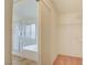 Bright bathroom with a glass enclosed shower and a bathtub. Also, it features a walk-in closet at 3429 Glacial Lake St, Las Vegas, NV 89122