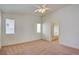 Spacious bedroom with neutral carpet and view of the bathroom at 3429 Glacial Lake St, Las Vegas, NV 89122